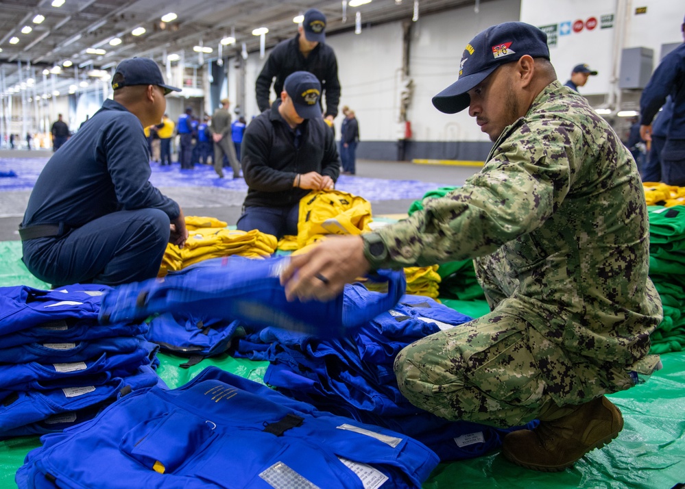 USS Ronald Reagan (CVN 76) Sailors conduct MK-1 Life Preserver inspection