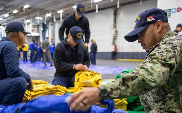 USS Ronald Reagan (CVN 76) Sailors conduct MK-1 Life Preserver inspection