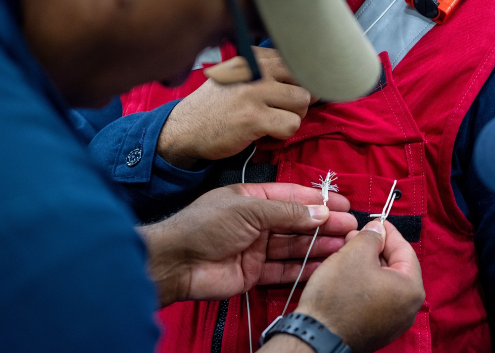 USS Ronald Reagan (CVN 76) Sailors conduct MK-1 Life Preserver inspection