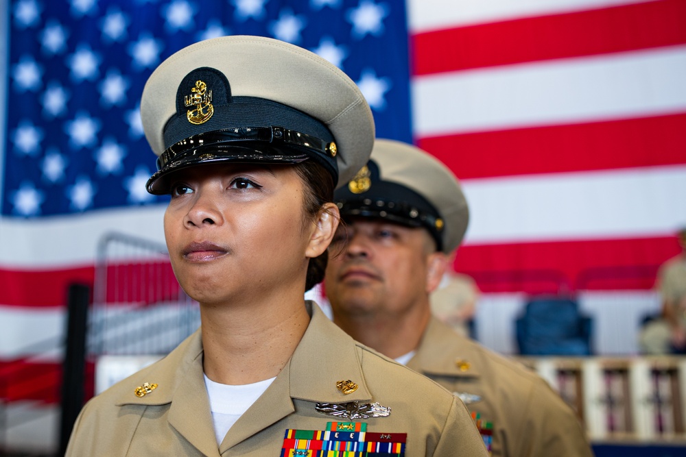 Sailors aboard USSGW conduct a chief pinning ceremony.