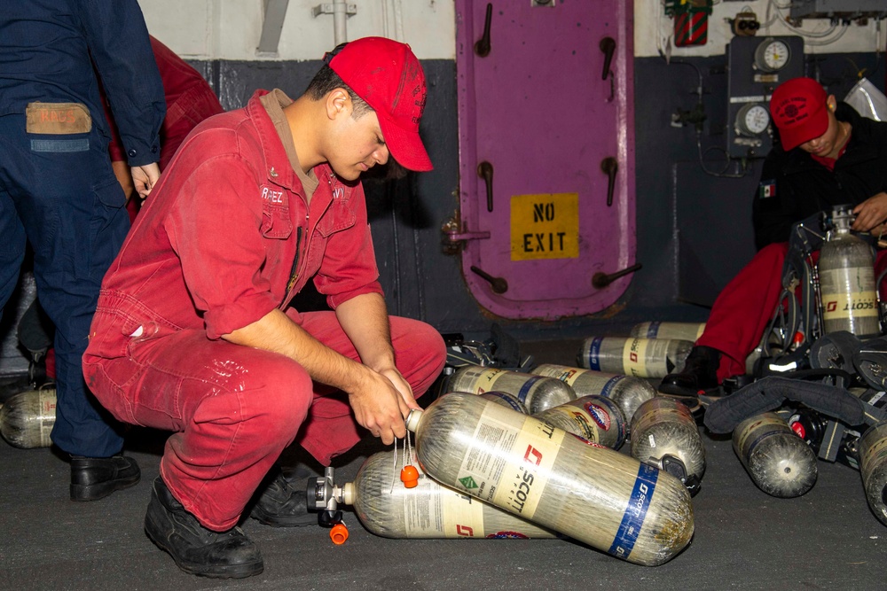 USS Carl Vinson Sailor Conducts Preventative Maintenance