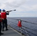 Sailors aboard the USS Howard conduct a replenishment-at-sea with the HMNZS Aotearoa in the South China Sea