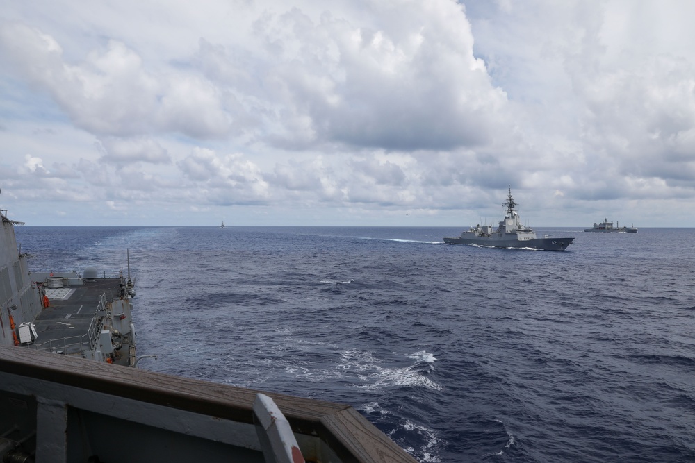 The USS Howard conducts a maneuvering exercise with ships from the Royal New Zealand Navy, the Royal Australian Navy, the Armed Forces of the Philippines Navy and the Japan Maritime Self-Defense Force in the South China Sea