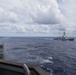 The USS Howard conducts a maneuvering exercise with ships from the Royal New Zealand Navy, the Royal Australian Navy, the Armed Forces of the Philippines Navy and the Japan Maritime Self-Defense Force in the South China Sea