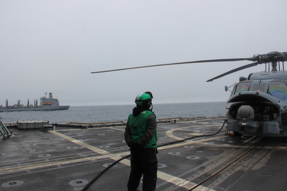 USS Lake Erie (CG 70) conducts replenishment at sea in the Northern Pacific Ocean