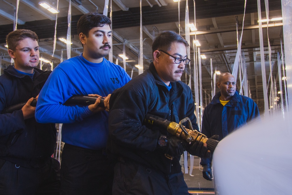 USS Ronald Reagan (CVN 76) Sailors test damage control equipment