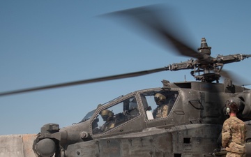 10th Combat Aviation Brigade AH-64 Apache Pilots Conduct Pre-flight Checks