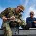 Sailors Replace Deck Edge Lights Aboard USS Carl Vinson (CVN 70)