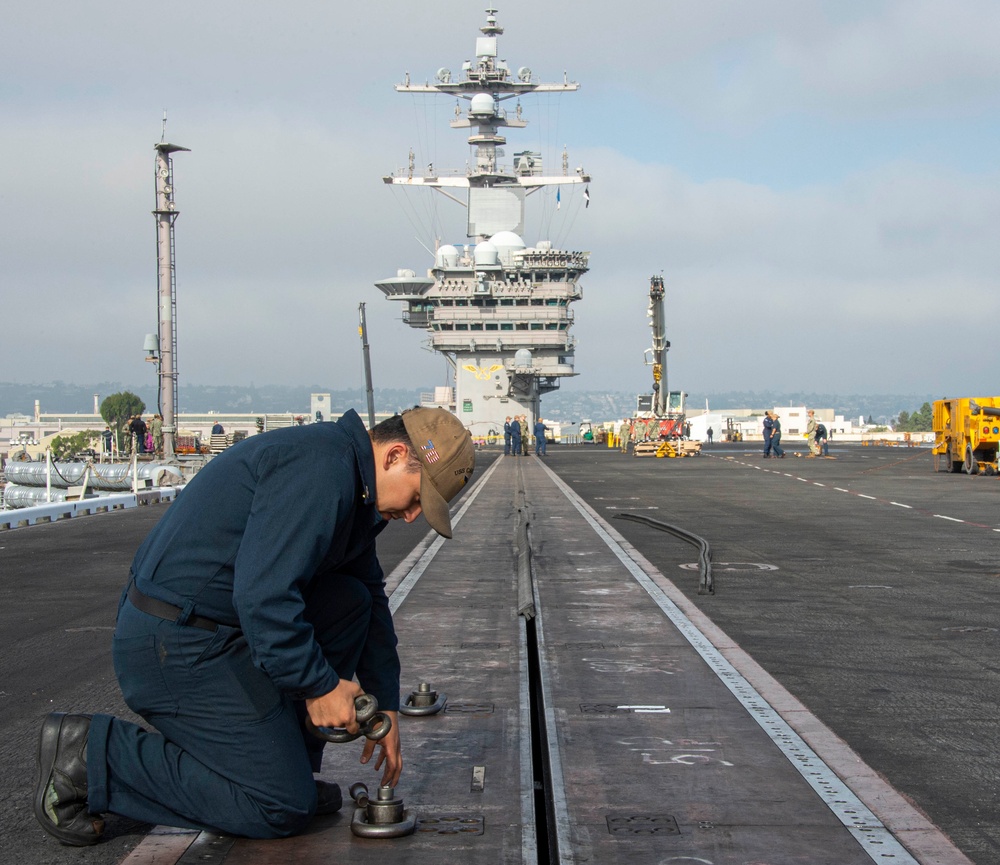 Sailor Performs Catapult Maintenance Aboard USS Carl Vinson (CVN 70)