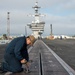 Sailor Performs Catapult Maintenance Aboard USS Carl Vinson (CVN 70)