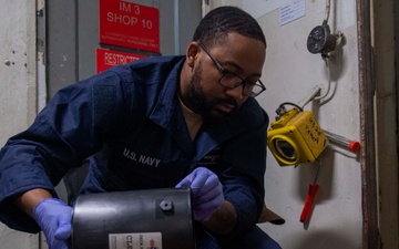 Sailor Prepares Epoxy Aboard USS Carl Vinson (CVN 70)