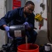 Sailor Prepares Epoxy Aboard USS Carl Vinson (CVN 70)