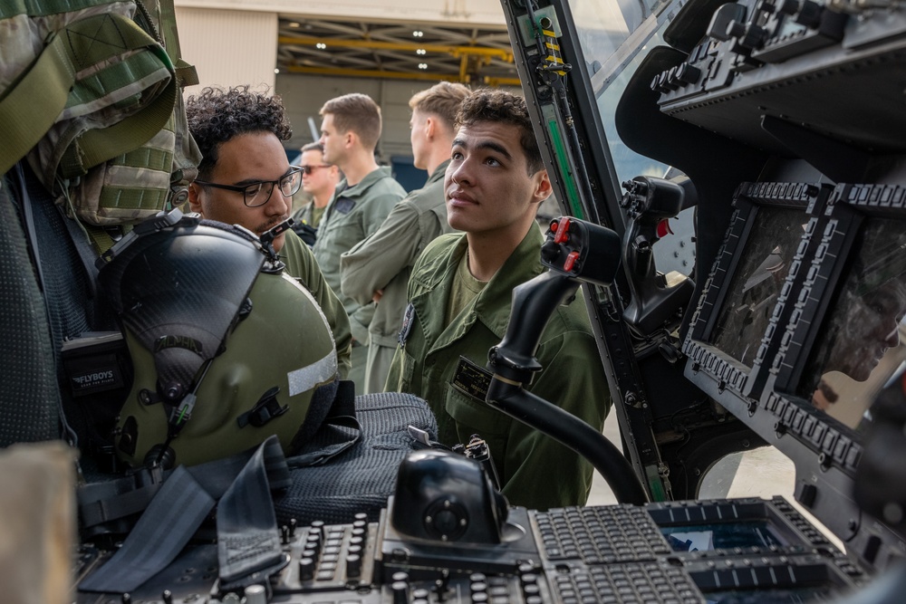 3rd MAW Marines and British Royal Navy aircrews conduct a subject matter expert exchange