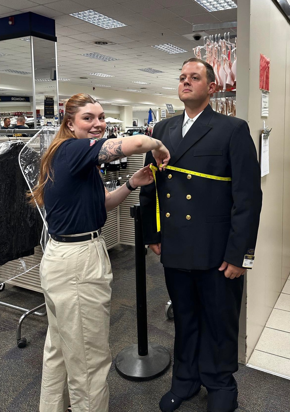 Navy Exchanges assist Chief Petty Officer selectees with new uniforms