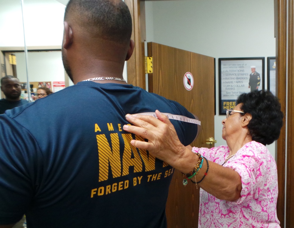 Navy Exchanges assist Chief Petty Officer selectees with new uniforms