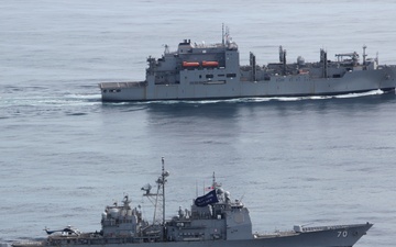 USS Lake Erie (CG 70) operates with USNS Yukon (T-AO 202) in the Northern Pacific Ocean