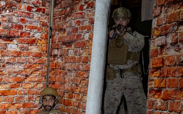 U.S. Marines and Royal Bahrain Marines Simulate Tactical Combat in Manama, Bahrain.