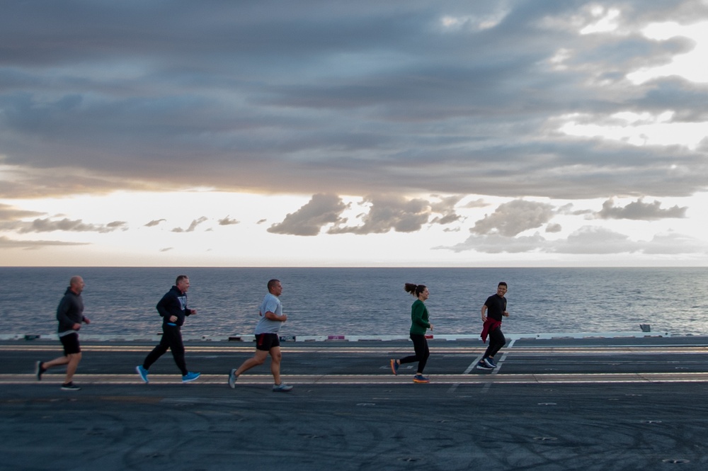 USS Ronald Reagan (CVN 76) Sailors participate in a flight deck run