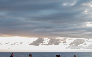 USS Ronald Reagan (CVN 76) Sailors participate in a flight deck run