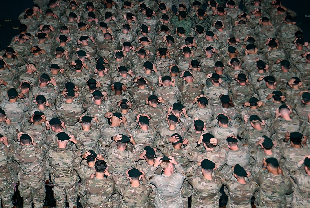 Soldiers Don Green Beret During Graduation