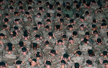 Soldiers Don Green Beret During Graduation