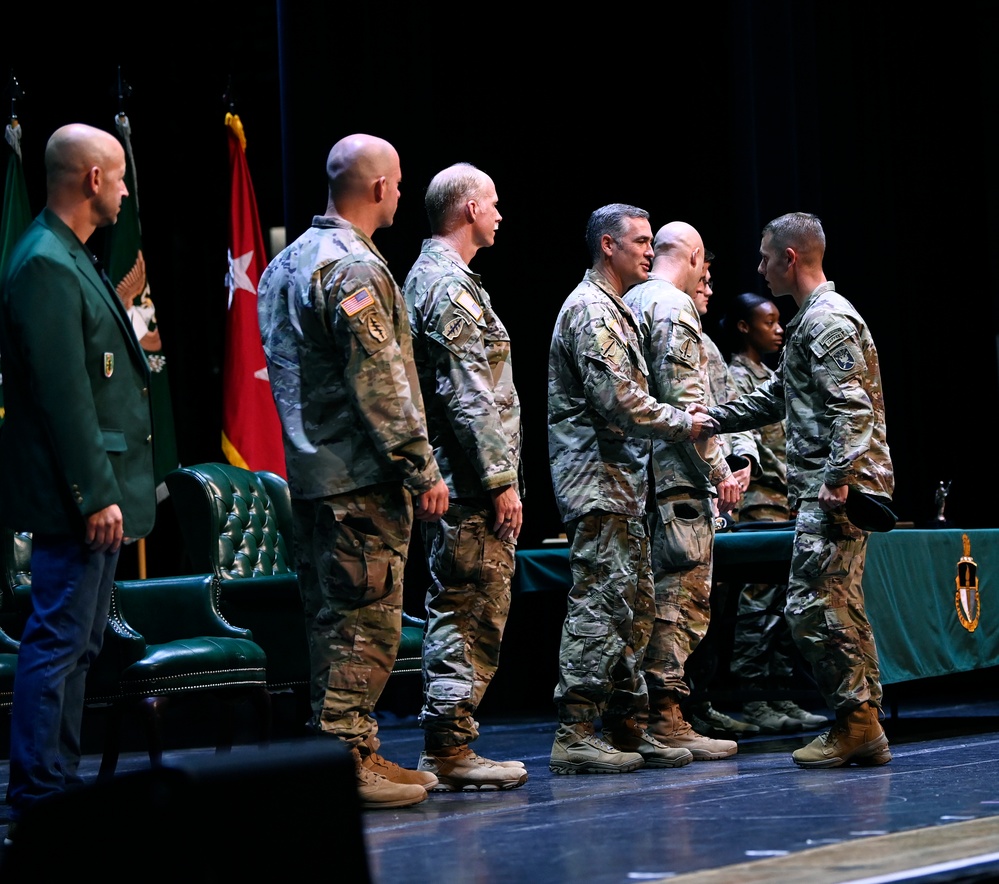 Soldiers Don Green Beret During Graduation