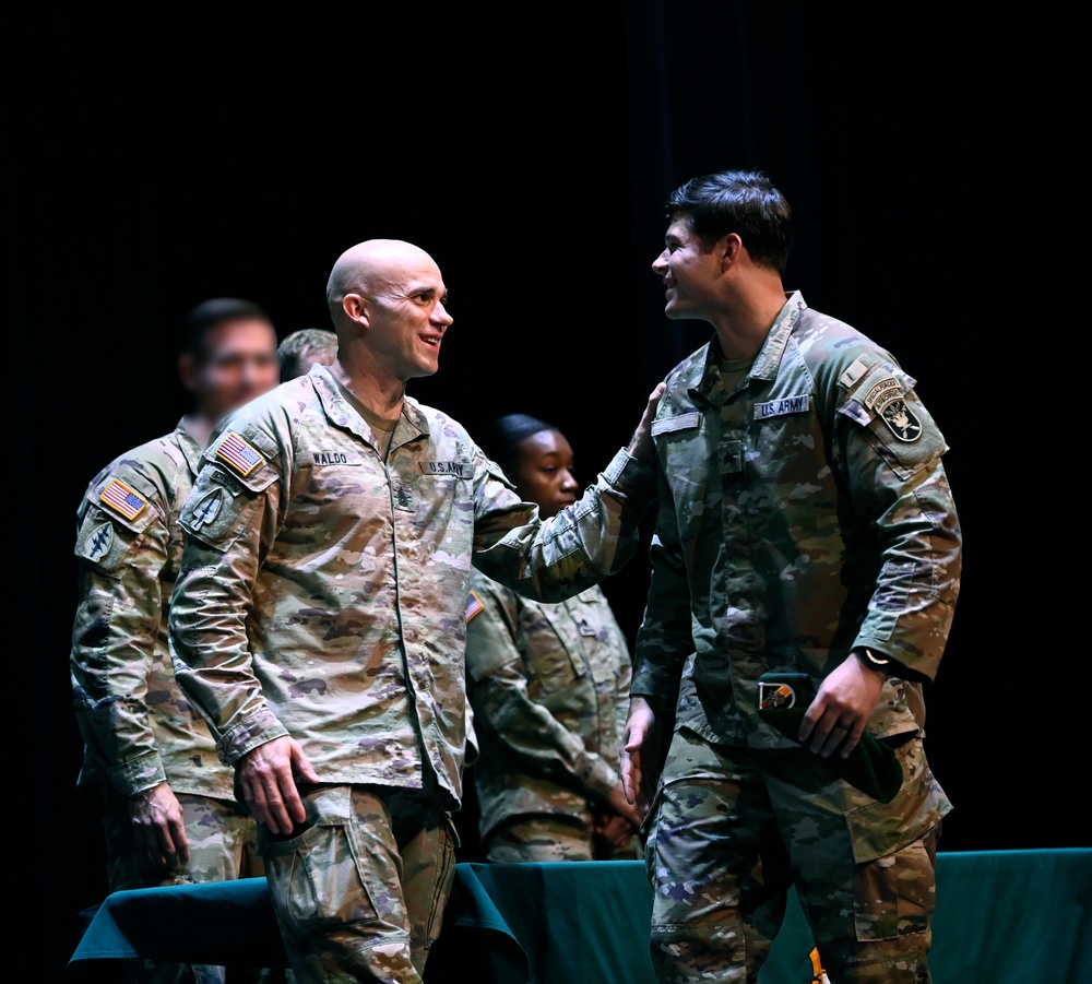 Soldiers Don Green Beret During Graduation