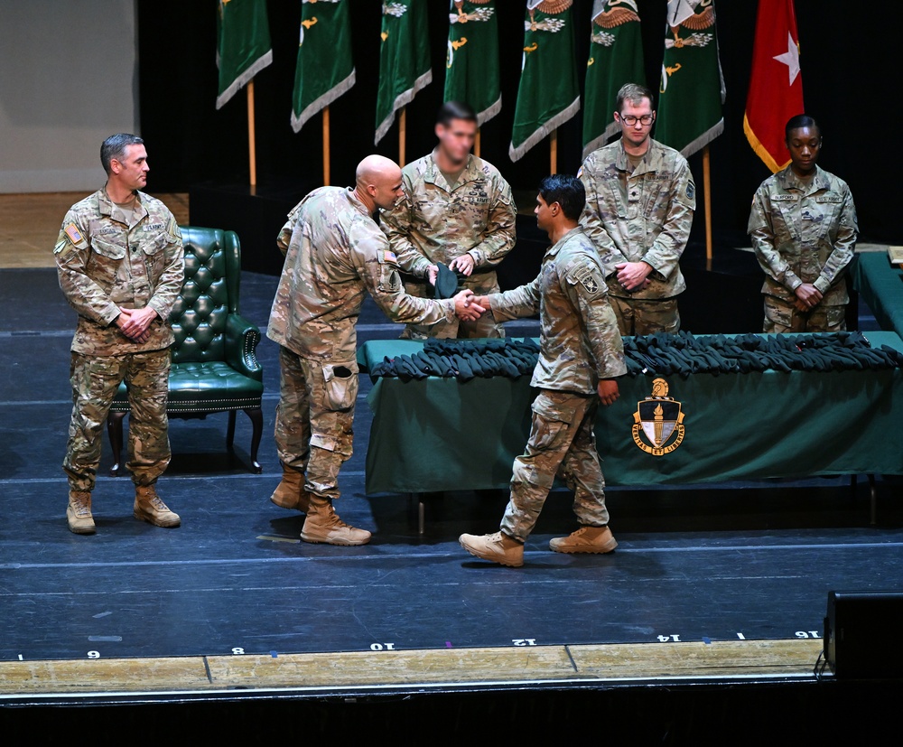 Soldiers Don Green Beret During Graduation