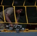 Boom operators prepare for cargo load