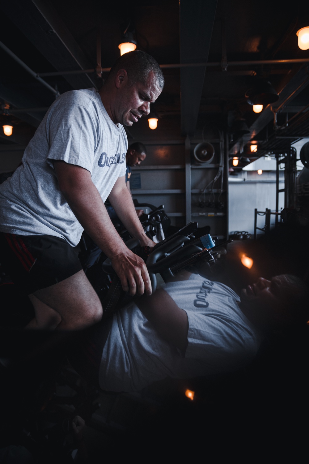 USS Ronald Reagan (CVN 76) Sailors attend a spin class