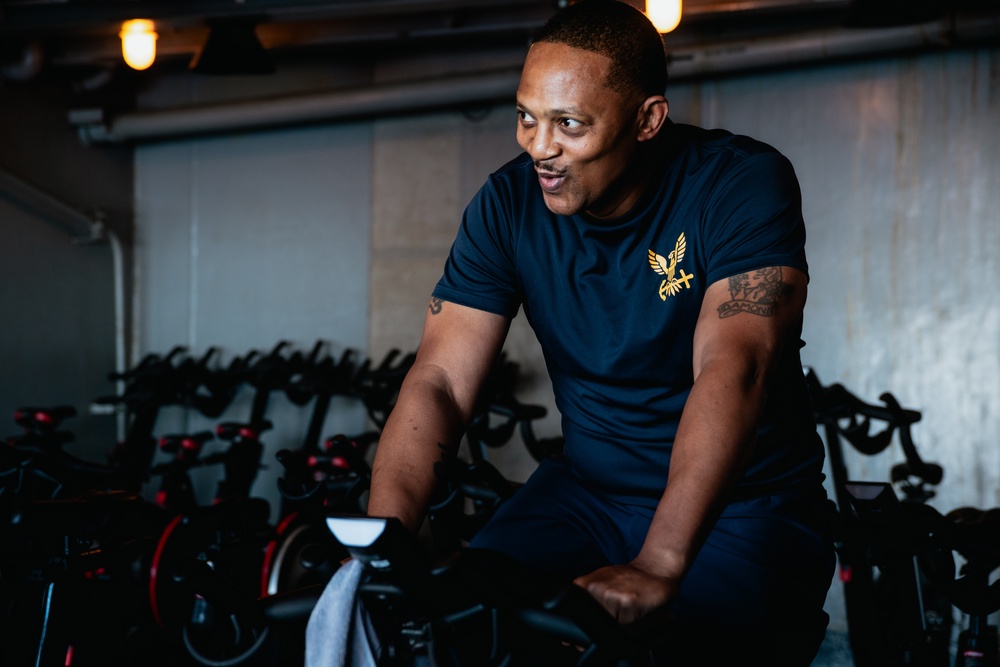 USS Ronald Reagan (CVN 76) Sailors attend a spin class