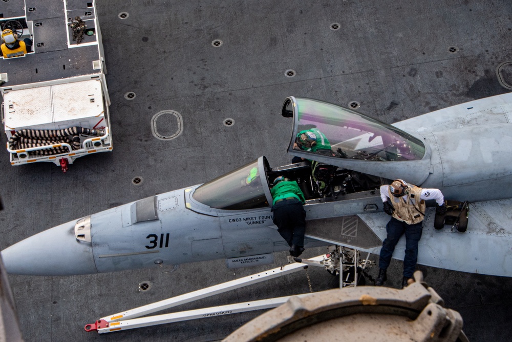 Nimitz Sailors Perform Maintenance on Aircraft