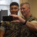 Brigadier General Collins Congratulates Marine of the Quarter