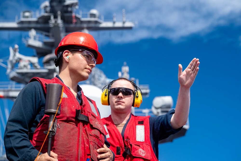 USS Theodore Roosevelt Refuels USS Mobile in Pacific Ocean