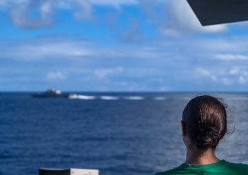 USS Theodore Roosevelt Refuels USS Mobile in Pacific Ocean