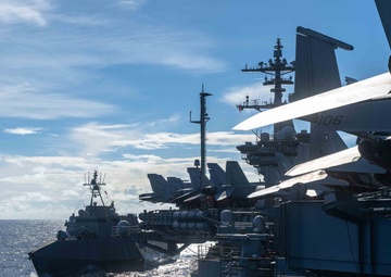 USS Theodore Roosevelt Refuels USS Mobile in Pacific Ocean