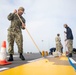 Tripoli Sailors Bring Ammo Onboard