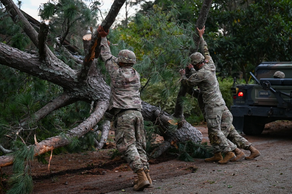 Georgia National Guard Soldiers conduct road clearing operations in Augusta