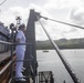 Emory S. Land Sailors Man the Rails During Arrival to Guam