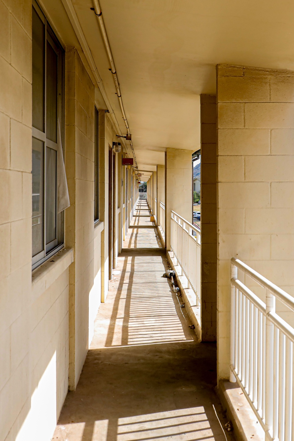 Out With The Old, In With The New: Construction workers prepare to demolish the Mackie Hall barracks