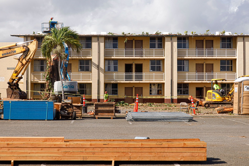 Out With The Old, In With The New: Construction workers prepare to demolish the Mackie Hall barracks