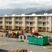 Out With The Old, In With The New: Construction workers prepare to demolish the Mackie Hall barracks