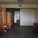 Out With The Old, In With The New: Construction workers prepare to demolish the Mackie Hall barracks