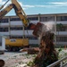 Out With The Old, In With The New: Construction workers prepare to demolish the Mackie Hall barracks