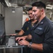 USS George Washington Sailors troubleshoot equipment