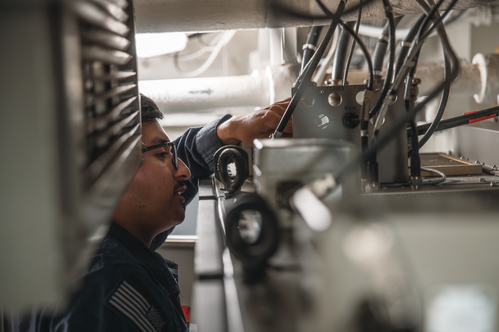 USS George Washington Sailors troubleshoot equipment