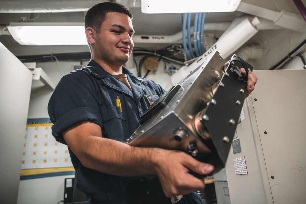 USS George Washington Sailors troubleshoot equipment