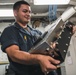 USS George Washington Sailors troubleshoot equipment