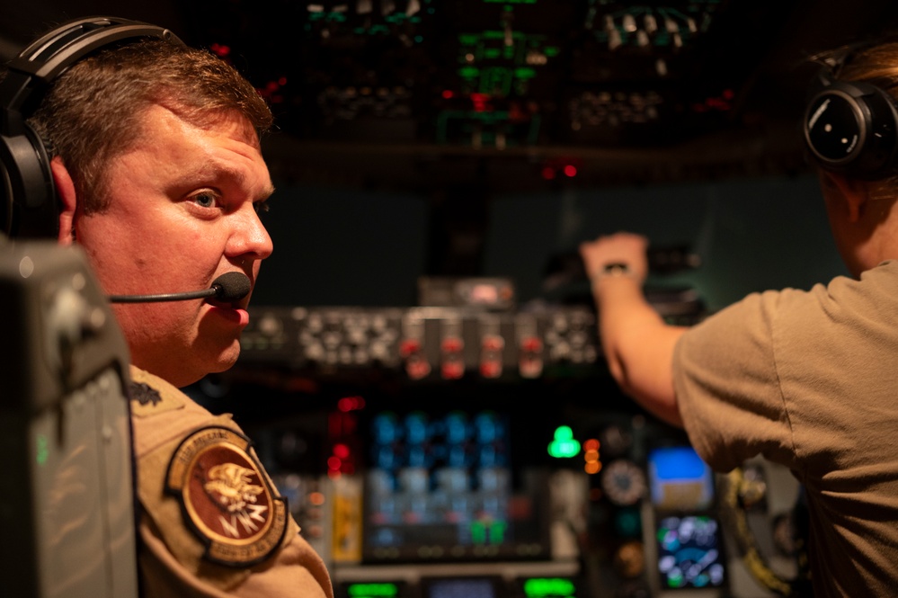 KC-135 Stratotanker refuels F-15E Strike Eagles