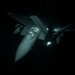 KC-135 refuels F-15Es at night